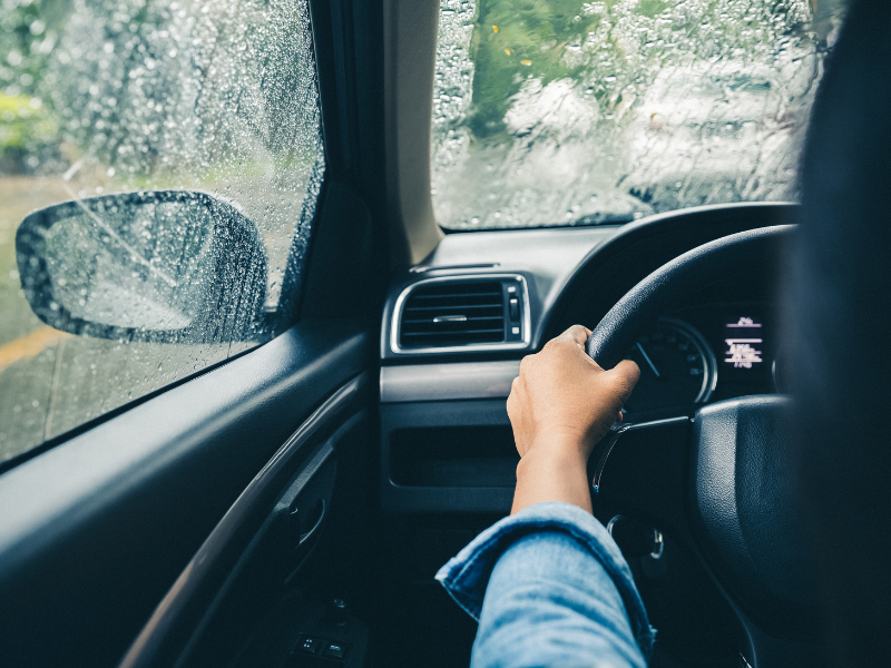 inside view of car driving through rain