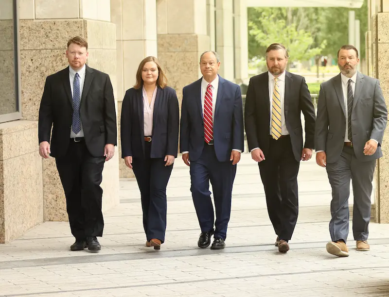 Cooper Hurley Injury Lawyers team walking together outside