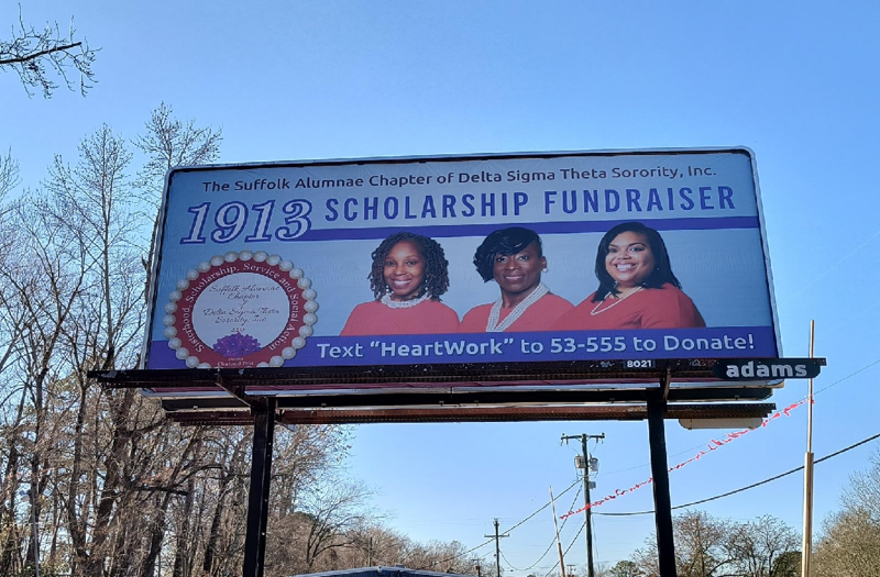 Billboard promoting a scholarship fundraiser event