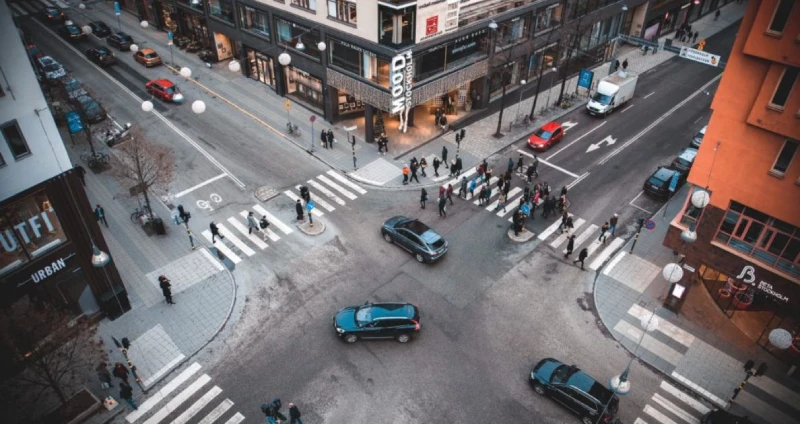 Pedestrians and vehicles at a busy city intersection