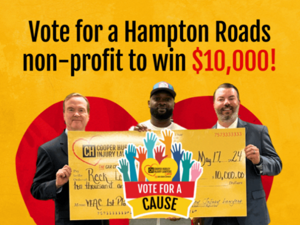 Cooper Hurley and client pose for a picture with cheque